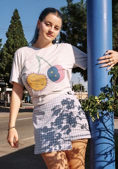 These sun and moon cherries are ripe and ready to be plucked from the heavens. Hand drawn design with vibrant colors and celestial sweetness. Printed on a unisex tee in White Fleck Triblend. 50% Polyester, 25% Cotton, 25% Rayon. Model wears size Medium. Retro Cherry Print T-shirt For Summer, Aesthetic Summer Streetwear Tops, Aesthetic Graphic Print Tops For Summer, Relaxed Fit T-shirt With Fruit Print For Spring, Aesthetic Graphic Print T-shirt For Summer, Summer Aesthetic Short Sleeve T-shirt, Casual Moon Print Tops For Spring, Trendy Spring Tops With Moon Print, Trendy Cotton T-shirt With Moon Print