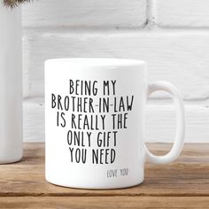 a white coffee mug with the words being my brother - in - law is really the only gift you need