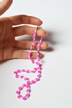 Pink Diy Jewelry, Flower Necklaces, Handmade Delicate Flower Beaded Necklaces, Handmade Delicate Flower Beaded Necklace, Delicate Handmade Flower Beaded Necklace, Pink Flower Necklace With Colorful Beads As Gift, Pink Flower Necklace With Round Beads For Gift, Flower Seed Bead Necklace, Pink Flower Pendant Necklace For Jewelry Making