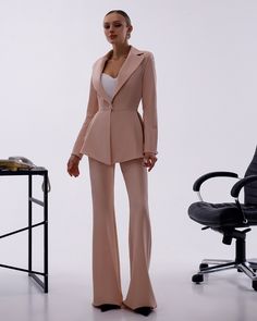 Please pay attention to suit measurements Pants total length is 115 cm or 45.2 inches (from waist to the bottom) Inseam length is 92 cm or 36.2 inches (from crotch to the bottom) Blazer length along the back 66 cm or 26 inches  Sleeve length is 62 cm or 24.4 inches 2-piece Womens Blazer Trouser Suit for office, business meetings, formal events and special occasions like civil wedding, elopement or birthday.  DETAILS -  flared pants -  side pockets -  slim fit   -  high rise -  blazer is buttoned -  lined -  peplum bottom MATERIAL Premium quality suiting fabric, which consists of viscose mostly and a bit of polyester and elastane SIZES The models in photos are wearing a size S (4 US numeric) Available in 4 sizes: XS= 2 US numeric BUST 32-34 inches or 82-86 cm WAIST 23-24.8 inches or 59-63 c Elegant Full-length Semi-formal Pantsuit, Elegant Semi-formal Full-length Pantsuit, Elegant Formal Set With High-waisted Pants, Elegant Dress Pants For Wedding, Elegant Full-length Dress Pants For Wedding, Elegant Wedding Dress Pants, Elegant Tailored Trousers Pantsuit, Fitted Formal Pantsuit With High-waisted Pants, Elegant Tailored Dress Pants For Wedding