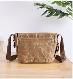 Cheap Waxed Canvas Shoulder Bag For Daily Use, Brown Outdoor Shoulder Bag With Canvas Lining, Khaki Shoulder Bag For Everyday Use, Functional Shoulder Bag For Outdoor Activities With Waxed Finish, Functional Waxed Finish Shoulder Bag For Outdoor Activities, Casual Brown Camera Bag For Everyday Use, Casual Brown Camera Bag For Everyday, Casual Outdoor Bag With Waxed Finish, Casual Outdoor Bags With Waxed Finish