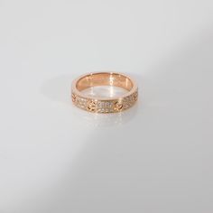 a gold ring with diamonds on it