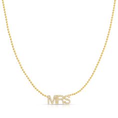 Just married? Say yes to our Mrs Necklace! Choose between our Signature Cable Chain for a dainty look or Bead Chain for a chic tangle free style. The adjustable clasp gives you two length options for the ultimate layering experience. 14K Gold Pendant is 5x13 mm Approximately .36 Total Diamond Weight In stock necklaces will ship within 3 business days. Made-to-order necklaces will ship within 1 week. Need it sooner? Contact us. *Even though pretty things take time, our Word Plates are so popular Yellow Gold Single Strand Necklace For Wedding, Elegant Wedding Name Necklace With Delicate Chain, Elegant Wedding Name Necklace With Adjustable Chain, Gold Diamond Necklace With Adjustable Chain For Wedding, Gold Single Strand Chain Necklace For Wedding, Yellow Gold Satellite Chain Jewelry For Wedding, Yellow Gold Diamond Necklace With Adjustable Chain For Wedding, Gold Beaded Necklace With Delicate Chain For Wedding, Gold Necklaces With Satellite Chain For Wedding