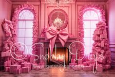 a room decorated with pink bows and presents for someone's special occasion, including a chandelier