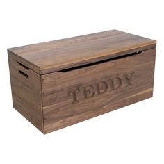 a wooden box with the word teddy engraved on it