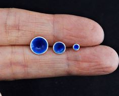 "Bright Blue Enamel Earrings | Tiny Dot Minimalist 6mm Studs | Second Hole for Men and Women 👇Click \"Learn more about item\"👇 Bright Blue enamel dot earrings. 6mm little pops of color for men and women. My most popular style. Fine silver with enamel in a tiny cup with a silver rim. Great for second hole. Nickel free and Lead free. Handmade in my sunny little studio. Also in 3mm and 9mm sizes....other colors too! Click the enamel link below 👇 ✦MORE * ENAMEL * DESIGNS✦ https://www.etsy.com/sho Tiny Blue Minimalist Earrings, Blue Enamel Earrings, Studs For Men, Blue Disc, Dot Earrings, Minimalist Studs, Enamel Earrings, Sapphire Blue, Blue Rings