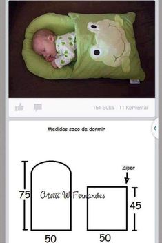 a baby is sleeping in a green pillow with numbers on the side and an image of a