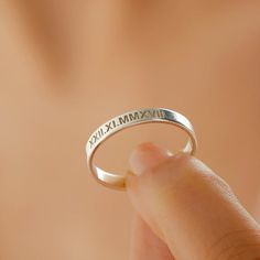 A meaningful gift for your friend, sister, mother, friend, bridesmaid, loved one or a special treat just for yourself. This affordable and thoughtful gift will surely be treasured by your loved one.This customized name ring can be engraved however you desire. Type your roman numeral, names, initials, your special date or inspirational words to design your necklace, make you unique and show off your personality.• Completely handmade items.• Various ring materials; from sterling silver to rose gol Classic Jewelry With Custom Text For Anniversary, Minimalist Custom Name Engraved Ring For Promise, Personalized Minimalist Stackable Rings, Minimalist Personalized Stackable Round Rings, Dainty Personalized Engraved Ring For Promise, Personalized Dainty Promise Ring, Dainty Personalized Engraved Promise Ring, Adjustable Rings With Custom Text For Gifts, Minimalist Jewelry With Custom Text For Anniversary