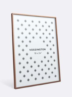 a white and wooden frame with black stars on the bottom that says vosington