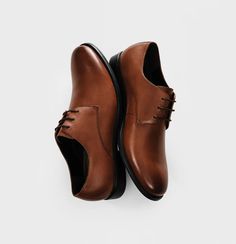 Brown Leather Shoes | The Black Tux Brown Plain Toe Lace-up Shoes With Leather Sole, Brown Lace-up Shoes With Textured Sole For Derby, Brown Lace-up Shoes With Leather Sole And Plain Toe, Brown Brogue Lace-up Shoes For Office, Classic Brown Lace-up Shoes With Almond Toe, Classic Brown Oxford Leather Shoes, Brown Plain Toe Lace-up Shoes For Business Casual, Brown Oxford Dress Shoes With Almond Toe, Semi-formal Brown Leather Shoes With Removable Insole