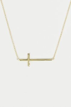 This delicate gold cross necklace is perfect for everyday wear! The dainty cross and chain make it easy to keep on and style with any outfit! Simple Necklace With Delicate Chain And Cross Pendant, Simple Cross Necklace With Delicate Chain, Simple Everyday Cross Pendant Necklace, Minimalist Gold Cross Necklace, Simple Everyday Cross Necklace, Simple Gold Cross Pendant Necklace, Gold Cross Necklace With Delicate Chain For Everyday, Everyday Gold Cross Necklace With Delicate Chain, Minimalist Cross Necklace With Delicate Chain Crucifix