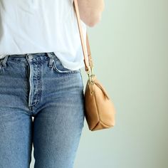 Beige undyed vegetable tanned leather purse, handmade with a zipper closure and removable leather strap, by Juliette Rose Designs Versatile Crossbody Bucket Bag For On-the-go, Versatile Crossbody Bucket Bag With Removable Pouch, Everyday Phone Bag Clutch With Cell Phone Pocket, Versatile Pouch Satchel With Cell Phone Pocket, Everyday Pouch Satchel With Cell Phone Pocket, Versatile Crossbody Bucket Bag For Daily Use, Everyday Phone Bag With Cell Phone Pocket, Modern Everyday Pouch Phone Bag, Modern Everyday Phone Pouch Bag