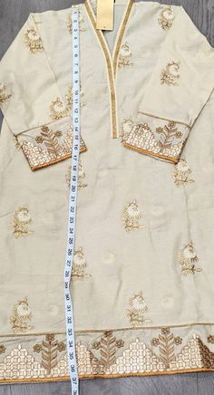 Floral Embroidered Kurta For Eid With Traditional Drape, Floral Embroidered Kurta With Traditional Drape For Eid, Traditional Drape Kurta With Floral Embroidery For Eid, Floral Embroidery Kurta With Traditional Drape For Eid, Floral Embroidered Kurta For Eid, Traditional Tunic With Traditional Drape For Festive Season, Traditional Festive Tunic With Traditional Drape, Traditional Drape Festive Tunic, Designer Tunic Sets With Dabka Work