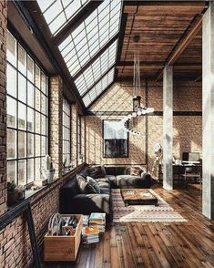 a living room filled with furniture and lots of windows