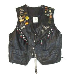 S.P. Leathers Womens Embellished Leather      Vest Fringe  Black  Sz M  Sleeveless  AA458 Snap Front Beaded Fringe Laced Up Sides, see Photos Previously worn.  Has many pin holes on    the front, see photos. Missing the size label,    fits like a medium, see measurements in the    description. Length  - 18.5" Armpit to armpit - 18" I will reduce shipping costs for multiple purchases paid with one PayPal payment.  There is no formula.  I will charge what it costs me to ship it to you.  If you mak Sleeveless Leather Jacket, Leather Vest Outfit, Star Fits, Masc Outfit, Vintage Leather Vest, Clothing Decoration, Jacket Pins, Ideal Wardrobe, Star Crossed