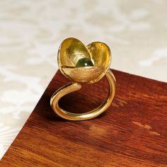 Bronze Big Flower ring, decorated with a stone, to choose carnelian, jade or freshwater pearl. CHECK OUR PROFILE IF WE HAVE ANY OFFER OR CODE AVAILABLE! https://www.etsy.com/es/shop/AtelierBcnJoiaShop ► We know that this year the world is a little crazy. The online sales have made the normal shipping services collapse, so from the team of Atelier BCN Joia we wanted to make the effort and propose that buying 2 pieces we make you a FREE and extra FAST shipping with a private company. We also wante Unique Gemstone Flower Ring Gift, Jade Open Ring For Gift, Jade Open Ring Gift, Jade Open Ring As Gift, Flower Shaped Gemstone Ring Gift, Flower Shaped Gemstone Rings For Gifts, Green Flower Ring Gift, Nature-inspired Flower Shaped Ring As A Gift, Nature-inspired Flower Shaped Gift Ring