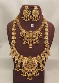 Exclusive bridal collection  Best quality Matt gold finish hand made  necklace, long haram,  suitable for weddings and occasions! Party and wedding wear Anteque gold  finish one gram gold bridal set with precious workmanship handmade jewellery with awesome workmanship and beautiful finishing just like temple jewellery for you open video must if any damages to report Gold Jhumkas For Marriage And Festive Occasions, Festive Gold Jhumkas For Marriage, Traditional Gold Jhumkas For Marriage, Gold Heavy Jhumkas For Marriage, Gold Chandbali Jhumkas For Marriage, Temple Jewelry Meenakari Necklaces For Marriage, Temple Jewelry Meenakari Necklace For Marriage, Gold Temple Jewelry With Hand Set Details, Gold Temple Jewelry Style Kundan Necklace For Marriage