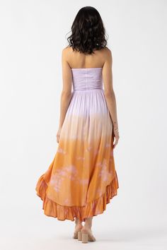 Embrace every moment in carefree style with lace up strings that can be tied in the front for a classic strapless fit or used to create a halter look. Featuring soft-fit comfort and draping fabric, the Aila Maxi Dress is a customizable piece designed to captivate. Details: 100% Rayon Hand wash cold & Lay flat to dry Features: Lace up sweetheart bodice, Can be worn strapless or halter, Ruffled high-low hemline Measures: Length from the top of the bodice to the shortest part of the hemline: approx Summer Strapless Ruched Tube Top, Strapless Fitted Dress With Smocked Bodice For Beach, Fitted Strapless Dress With Smocked Back For Beach, Beach Strapless Dress With Smocked Back, Spring Strapless Dress With Knotted Straps, Summer Strapless Fitted Dress With Tie Back, Strapless Summer Dress With Lace-up Back, Fitted Strapless Summer Dress With Tie Back, Summer Fitted Strapless Dress With Tie Back