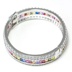 Material:100% 925 Sterling Silver Plated Main stone: Lab Created Red Topaz Gemstones (Garnet) Other stone: Lab Created Blue, Yellow, Morgan, White Topaz Gemstones (Morganite, Citrine, Sapphire) Width: 3/5 inches Size: 8 inches Condition:New Main color:Multicolor Quantity:1 Pc This multicolor bracelet is made with lab created red, blue, yellow, pink, morgan and white topaz gemstones and 100% 925 sterling silver plating for better quality and prolonged shine! Please check my other beautiful silver Multicolor Cubic Zirconia Jewelry With Sparkling Stones, Multicolor Cubic Zirconia Jewels Jewelry, Multicolor Cubic Zirconia Jeweled Jewelry, Colorful Bangle Jewelry As A Gift, Colorful Bangle Jewelry Gift, Fine Jewelry With Sparkling Multicolor Stones, Multicolor Cubic Zirconia Stone Jewelry, Colorful Bangle Jewelry For Gifts, Elegant Colorful Bracelets For Gifts