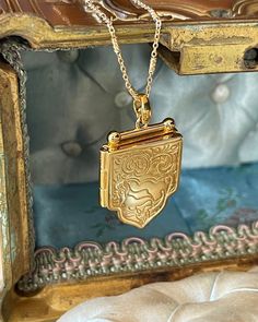 Beautiful Shield Locket Necklace with beautiful details. Gold plated silver locket and chain. Locket measurements 25.7mmx28mmx4mm. Wedding Jewelry Gold, Chain Locket, Gold Shield, Locket Design, Picture Locket, Latest Jewellery Trends, Silver Locket, Head Jewelry, Gold Locket