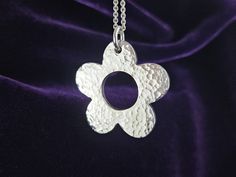 This beautiful simple flower design was hand carved by me in jewellers wax then was cast in solid sterling silver. This pendant was never moulded which makes this piece a one of a kind. The flower itself measures approximately 36mm in diameter and is lightly hammer textured on both sides. Simple Flower Design, Silver Flower Necklace, Daisy Jewelry, Simple Flower, Floral Pendant, Flower Pendant Necklace, Copper Necklace, Sterling Silver Flowers, Floral Jewellery