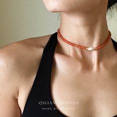 *Handcrafted: Each piece is meticulously handmade, ensuring a personal touch in every necklace. *Natural Stones: Utilizes genuine Red Agate, promising natural beauty and uniqueness. The Red Agate's gentle blaze of red and orange hues offers a feeling of warmth and softness, deeply cherished for its rich tones. *Size: Features a 14-inch choker length with a 5cm extension chain for adjustable fitting. *Designer Piece: Exclusively designed by me, showcasing a blend of creativity and craftsmanship. Red Beaded Agate Necklaces, Bohemian Pearl Necklace With Tiny Beads For Gifts, Red Bohemian Crystal Necklace As Gift, Bohemian Beaded Choker With Clavicle Chain, Red Bohemian Crystal Necklace For Gift, Red Bohemian Shell Necklace For Gift, Handmade Red Agate Necklace, Handmade Red Coral Pearl Necklace Gift, Red Bohemian Choker Necklace