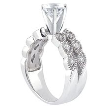 an engagement ring with a horse head on the side and diamonds in the middle, set against a white background