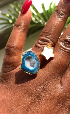 Add a touch of whimsical glam to your look with Quinn! This gorgeous ring features a sparkling blue geode quartz stone with a shimmering druzy star accent. Make a stellar statement with this unique piece that combines natural beauty and playful style.  24k Gold-edged Size: 8.5-9 Geode Ring, Blue Geode, Playful Style, Gorgeous Ring, Blue Ring, Ring Blue, Star Ring, Blue Rings, Quartz Stone