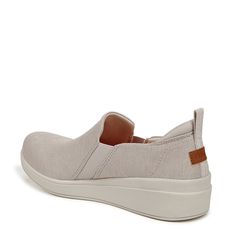 Just slip on and go in these casual, incredibly lightweight womens slip-on sneakers.