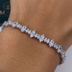 6.10 Carat Diamond Tennis Bracelet, Marquise Cut Lab Grown Diamond Pave Set Bracelet, 14k White Gold Bracelet for Her ✤ Center Stone Details:   - 𝐂𝐮𝐬𝐭𝐨𝐦𝐢𝐳𝐞: Yes - 𝐂𝐡𝐚𝐢𝐧/ 𝐍𝐞𝐜𝐤𝐥𝐚𝐜𝐞 𝐓𝐡𝐢𝐜𝐤𝐧𝐞𝐬𝐬:  - 𝐌𝐞𝐭𝐚𝐥: 925 Silver / 10K Gold / 14k Gold - 𝐒𝐭𝐨𝐧𝐞: Lab Grown Diamond - 𝐂𝐥𝐚𝐫𝐢𝐭𝐲: VVS - 𝐂𝐨𝐥𝐨𝐫: D-E-F - 𝐂𝐮𝐭: Very Good - 𝐏𝐨𝐥𝐢𝐬𝐡: Excellent - 𝐂𝐨𝐧𝐝𝐢𝐭𝐢𝐨𝐧: New ↦ Making Process: Handmade - Crafted by our experienced team Diamond Shape : Marquise Cut  Diamond Total Weight: 6.10cts + Metal Weight: 13.30 grams Each Diamond Weight: .35ct -.40ct. each Diamond Color: DEF Diamond Clarity: VS+ ➥ Metal Metal:  Silver / Gold Yellow gold ( 10kt / 14kt) Rose gold ( 10kt / 14kt) White Gold ( 10kt / 14kt) ✤𝐏𝐫𝐨𝐝𝐮𝐜𝐭𝐢𝐨𝐧   - All items are made to Luxury Diamond White Diamond Cut Chain Bracelet, Luxury Lab-grown Diamond Engagement Bracelet, Luxury Marquise Diamond Bracelet For Anniversary, Luxury Marquise Cut Bracelets For Anniversary, Luxury Marquise Diamond Cut Bracelets, Luxury Marquise Cut Diamond Bracelet For Formal Occasions, Luxury Marquise Cut Diamond Bracelet For Formal Events, Luxury Marquise Cut Diamond Bracelet For Anniversary, Luxury Wedding Diamond Bracelet With Marquise Cut