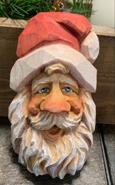 a close up of a gnome's head on a table