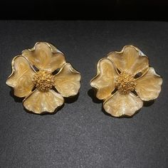 Bold, Beautiful & Oversized Cream Enamel And Goldtone Flower Clip On Earrings. Brand New Without Tags. Measures 2” X 2” And Are Quite Larger Than An American Quarter But Quite Light Weight! I’m Considered The “Clip On Queen”, However, I Do Have Pierced Earrings And Ears. When You Have Pierce Ears You Can Wear Them Both! Fyi...Clip On Earrings Can Be Loosened And Tightened To Fit Your Ears Comfortably! Flower Clip, Enamel Flower, Cream And Gold, Pierced Earrings, Dream Clothes, Earings Piercings, Clip On, Ear Piercings, Clip On Earrings