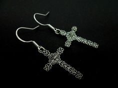 This a pair of cute tibetan silver celtic cross themed earrings with 925 solid silver hooks. Measure approx. 4cm from top of hook to bottom of earring. Freshly made by me and unworn. Thanks for looking!! Sterling Silver Cross Pendant Earrings For Gift, Nickel Free Adjustable Cross Earrings, Silver Metal Cross Pendant Earrings, Handmade Metal Cross Earrings, Nickel Free Sterling Silver Cross Earrings, Sterling Silver Cross Earrings With Ear Wire, Nickel-free Sterling Silver Cross Earrings, Nickel-free Cross-shaped Sterling Silver Earrings, Metal Cross Pendant Earrings For Gift