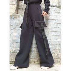 "high-waisted long pants with two outer leg pockets and two side pockets on the waist is elasticated.The pants is suitable for winter, autumn and early autumn🤩 Extravagant designs and high quality fabrics. The item from the pictures is size S  For more information feel free to ask questions. Material &Care Cotton and elastane  Machine wash 30oC Hand wash at low temperatures Do not machine dry Medium hot iron Sizing  We make sizes from xs to 5xl as well as customized measures.So don't hesitate t High-waisted Wide Leg Pants With Multiple Pockets For Work, Full-length Parachute Pants With Multiple Pockets For Workwear, Full-length Parachute Pants With Multiple Pockets, Techwear Bottoms For Winter, Winter Techwear Long Pants, High Waist Solid Color Cargo Pants For Winter, Baggy Utility Bottoms For Winter, High-waisted Pants With Pockets For Fall, Trendy Full Length Cargo Pants For Winter