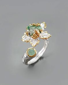 ♥ WILL BE MADE TO ORDER This ring features an amazing raw emerald gemstone in bright green color. It is placed in a nature inspired setting with branches and leaves on the band. Handcrafted with great details in white & yellow gold color. This is a perfect Birthday gift, great for Anniversaries and Graduating Gifts. Fitting for a teen girl or a woman. Could be a very special gift for your mom on Mother's Day! ♥ Each order will be gift wrapped beautifully ♥ QUALITY: Each item is stamped according Raw Emerald Ring, Silver Anniversary Gifts, Raw Emerald, Branch Ring, Raw Stone Ring, Ring Flower, Silver Anniversary, Anniversary Gifts For Wife, Gifts For Your Mom