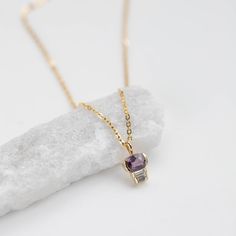 Purple-pink unheated Ceylon sapphire necklace with baguette diamonds in 14K solid gold, featuring a 0.71ct natural sapphire, a perfect gift for women. ● Metal: 14K solid gold ● Gemstones: Unheated Ceylon Sapphire 6mm x 4.5mm Cushion cut, Diamonds 3mm x 1.5mm Baguette cut ● Gemstone's weight: Sapphire 0.71 ct, Diamonds 0.16ct  ● Sold with or without chain ● Length: 45 cm - 17.5 inches H O W ∙ T O ∙ O R D E R Choose from the drop-down menu the available options (Style) and leave us a note for any special requirements. G I F T S All our pieces are delivered beautifully packaged and gift ready with a certificate of authenticity for the metal and the stones. P R O D U C T I O N ∙ T I M E * S H I P P I N G * P O L I C I E S Please keep in mind that each item is handcrafted, and we need 5 days at Diamond Baguette Cut Gemstone Necklaces, Diamond Necklaces With Baguette Cut Gemstone, 14k Gold Baguette-cut Fine Jewelry Necklace, 14k Gold Baguette Cut Fine Jewelry Necklace, Fine Jewelry 14k Gold Baguette Cut Necklace, Yellow Gold Baguette Cut Necklace For Gift, Fine Jewelry Diamond Baguette Necklace, Fine Jewelry Diamond Baguette, Fine Jewelry Baguette Diamond