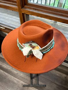 Discover the rugged charm of our Burned Western Hat. This unique, handcrafted cowboy hat features a distressed look, giving it a vintage, well-worn appeal perfect for Western enthusiasts and fashion-forward individuals. Features: Handcrafted Design: Each hat is meticulously burned and distressed to achieve a one-of-a-kind look. Premium Materials: Made from high-quality materials for durability and comfort. Unique Aesthetic: The burned finish adds a distinctive vintage style that sets it apart. B Distressed Brown Wide Brim Hat For Western-themed Events, Wide Brim Distressed Brown Hat For Western-themed Events, Distressed Brown Wide Brim Hat For Western Events, Rustic Distressed Brown Hat For Western-themed Events, Distressed Brown Wide Brim Hat For Rodeo, Rustic Wide Brim Felt Hat For Ranch, Distressed Brown Wide Brim Hat For Country Events, Wide Brim Distressed Brown Hat For Country Events, Vintage Handmade Hats For Ranch