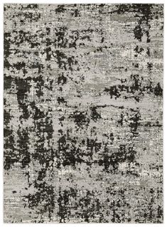 an abstract rug with black and white colors