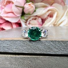 🐣. Offer Xtras! Emerald And Moissanite Round Three Stone Engagement Ring Set In 14K White Gold for $745.0 #BridalGift #MoissaniteRing #LabCreatedEmerald #LadiesRing #MayBirthstone #BirthdayGift #ThreeStoneRing #TravelRing #WeddingRing #EmeraldRing Green Moissanite Diamond Ring With Vvs Clarity, Gia Certified Cubic Zirconia Round Emerald Ring, Green Diamond Ring With Vvs Clarity For May Birthstone, Green Diamond Ring With Round Band, Emerald Ring With Vvs Clarity Round Cut, Brilliant Cut Diamond Ring For May Birthstone, Green Diamond Ring With Brilliant Round Cut, Green Diamond Ring With Vvs Clarity For Anniversary, Green Diamond Ring With Brilliant Cut