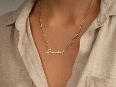 This 14k solid gold name necklace is made from a dainty, yet chic flat figaro chain. Its beautiful finish shines against your skin to accentuate your beauty. Don't forget to choose the best length that works for you! FEATURES • Material: 14k Solid Gold (Stamped 14K for authenticity) • Color Options: Yellow Gold • Chain Style: Flat Figaro Chain • Chain Width: 3.00 mm • Clasp Type: Lobster Clasp • Available Lengths: 14", 15", 16", 17", 18", 19", 20" For custom lengths feel free to contact us. We c Elegant Personalized Curb Chain Jewelry, Elegant Curb Chain Jewelry For Personalized Gift, Elegant Jewelry With Curb Chain For Personalized Gift, Elegant Personalized Yellow Gold Chain Necklace, Elegant Name Pendant Chain Necklace, Anniversary Silver Name Necklace With Figaro Chain, Elegant Personalized Curb Chain Necklace, Elegant Custom Name Chain Necklace, Elegant Necklace With Curb Chain For Personalized Gift