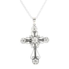 Decorated with flowers and looping designs a majestic cross is crafted from sterling silver accentuated by a combination between high-polish and oxidized finishes. India's Shivany Choudhary designs this faithful pendant necklace. Sterling Silver Necklace With Oxidized Cross Pendant, Spiritual Silver Cross Necklace With Oxidized Finish, Antique Silver Cross Necklace In Sterling Silver, Antique Silver Sterling Silver Cross Pendant Necklace, Antique Silver Sterling Silver Cross Necklace, Elegant Cross Pendant Necklace With Oxidized Finish, Elegant Oxidized Cross Pendant Necklace, Antique Silver Cross Necklace With Oxidized Finish, Antique Silver Oxidized Cross Necklace