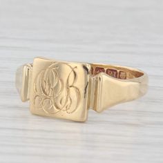 Metal: 18k Yellow Gold  Weight: 3.2 Grams  Stamps: British Hallmarks Face Height: 8.6 mm  Rise Above Finger: 0.9 mm Band / Shank Width: 3.1 mm This ring is a size 8, but it can be resized down 3 sizes for a $30 fee or up 3 sizes for a $50 fee. If you would like your ring resized, please select the appropriate fee from the listing below in order to pay the sizing fee: https://www.etsy.com/listing/781388346/ring-sizing-service-fee Each piece is thoroughly examined and refinished as needed by our professional jewelers, graded by our in-house GIA (Gemological Institute of America) Graduate Gemologist, and inspected for quality before being carefully packaged and promptly shipped. [SKU: B35329] phd Classic Yellow Gold Signet Ring With Maker's Mark, Timeless Gold Signet Ring With Hallmarks, Classic White Gold Initial Ring With Diamond Cut, Engraved Yellow Gold Signet Ring For Formal Occasions, Formal Engraved Yellow Gold Signet Ring, Classic Yellow Gold 14k Signet Ring, Classic 14k Yellow Gold Signet Ring, Formal Gold Signet Ring Stamped 14k, Gold 14k Stamped Signet Ring For Formal Occasions