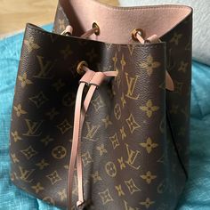 Authentic Louis Vuitton Monogram Rose Poudre Pink Mm Neo Noe. Just Realize I Lost The Shoulder Strap In My Recent Move So Price Low To Sell. Few Scruff And Flaws Because Of The Far Of Bag. You Can Carry With Her Generic Strap Found Online Or Order Replacement From Lv Store. Code Is Sd 4167- Price Firm And No Returns. Lv Store, Louis Vuitton Neonoe, Rose Pink, Authentic Louis Vuitton, Pink Roses, Louis Vuitton Monogram, To Sell, Shoulder Strap, Bag Lady