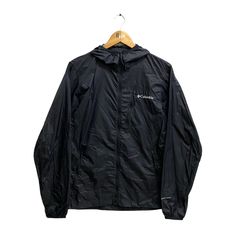 "Code : p/utc Vintage Columbia Windbreaker Men Black Jacket Large Columbia Usa Sportswear Company Jacket Sports Columbia Light Jacket Hoodie Embroidered  Size on Tag :  S Details Measurement  Arm Pit to Arm Pit : 19\"inches Back Collar to Hem : 27\"inches Condition :  Great Vintage Condition(Used Clothing).No Holes And No Stain.Please refer pictures detail.‼️" Vintage Columbia Jacket, Hooded Nylon Track Jacket With Moisture-wicking, Hooded Moisture-wicking Nylon Track Jacket, Moisture-wicking Hooded Nylon Track Jacket, Black Waterproof Track Jacket For Sports, Black Windproof Windbreaker For Sports, Black Moisture-wicking Windbreaker For Outdoor Activities, Black Athleisure Outerwear For Hiking, Outdoor Windbreaker With Double-lined Hood