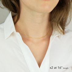 "Minimal and modern dainty chain necklace in 14k gold fill, sterling silver, or 14k rose gold fill that is perfect for layering. Single, double layer or paired with your other necklaces will make a statement for any occasion. H O W * T O * O R D E R * Select the metal * Select the length * Model is XS and wearing 2 at 15\" in the 1st photo and 13-14\" in the 2nd photo * Shorter length options come with 1 inch extension chain * Send us a message for a length not list here D E T A I L S * Availabl Double Strand Gold Chain Jewelry Gift, Figaro Chain Choker Jewelry As Gift, Figaro Chain Choker Jewelry For Gift, Delicate Link Chain Necklace For Anniversary, Link Delicate Chain Necklace For Anniversary, Minimalist Double Chain Necklaces As Gifts, Minimalist Double Chain Necklace As Gift, Double Strand Delicate Chain Necklace For Gift, Double Chain Yellow Gold Jewelry As Gift