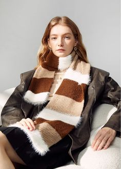 Stay warm and stylish this winter with our brown colorblock long scarf. Made from a soft wool blend, this scarf is perfect for women looking to make a statement while braving the cold. With its versatile color and long length, it's a must-have accessory for the season. 70" x 11" /180cm x 28cm 60% acrylic, 29% polyester, 7% wool, 4% spandex Hand wash, dry flat Item #492423 Long Scarf, Soft Wool, Sweater Coats, Two Piece Outfit, Long Length, Stay Warm, Color Blocking, Pant Jumpsuit, Wool Blend