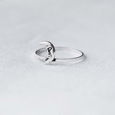 Real 925 Sterling Silver Crescent Moon Ring Ring Face Measures 8.50 x 6mm Ring Band Thickness measures 1mm Jewelry will come in a gift box * Please read shop policy before placing an order * *JEWELRY CARE* Sterling Silver will tarnish over time, but to help keep your jewelry looking beautiful - Clean with a soft dry cloth after wear and store inside an airtight bag or container. Remember to remove your jewelry when: * Applying lotion or sunscreen * Applying perfume * Taking a shower / bath * Wor Crescent Moon Face, Applying Perfume, Eye Ring Silver, Celtic Moon, Crescent Moon Ring, Face Ring, Minimal Ring, Silver Eye, Moon Face