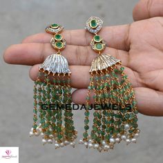 Emerald Beads Earrings, Pave Diamond Earrings, Pearl Beads Earrings, Emerald Silver Jewelry, 925 Silver Long Earring, Gold Plated Jewelry Gross Weight: 24.36 gram Gemstone Weight: 2.97 cts Diamond Weight: 0.75 cts Earrings Size: 103X14 MM NOTE:- All The Products Are Designed And Manufactured In My Workshop By Me & My Team. Shown Products Are Purely Handmade. Custom Orders Are Open Handly Accepted. We Are the Perfect Choice For Any Custom Jewelry Manufacturing. For Bulk Orders Please Message Elegant Dangling Beads Earrings For Festivals, Elegant Dangling Beaded Earrings For Festivals, Elegant Beaded Earrings With Dangling Beads For Festivals, Elegant Polished Beads Earrings For Party, Elegant Party Earrings With Polished Beads, Traditional Polished Beads Earrings For Wedding, Green Dangling Beads Earrings For Festivals, Elegant Pearl Earrings With Dangling Beads For Festivals, Green Dangling Beads Earrings For Wedding