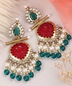 Beautiful dangler earrings with Kundan gold detailing available in 10 stunning colours! They add elegance to every outfit! Traditional Red Pearl Earrings For Party, Fusion Style Kundan Danglers For Festive Occasions, Kundan Pearl Earrings For Festivals And Celebrations, Festive Fusion Kundan Danglers, Fusion Style Kundan Danglers For Festivals, Fusion Kundan Danglers For Festivals, Fusion Style Chandbalis With Gota Work For Diwali, Festive Cutdana Pearl Earrings, Festive Cutdana Chandelier Earrings