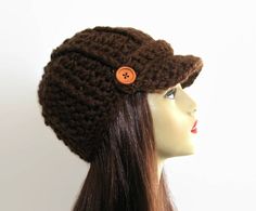 This is made to order. This hat is crocheted with chunky weight acrylic brown yarn. Buttons may vary depending on availability. If you would like a different color just let me know. Some of the other colors I have are black, black tweed, brown, brown tweed, oatmeal tweed, taupe, gray tweed, light gray, dark purple and white. However, if you want a different color I can get whatever you like. Hand wash is recommended. Check out all my newsboy hats here: https://www.etsy.com/shop/CreativeDesignsby Brown Hand Knitted Cap, Hand Knitted Brown Cap, Adjustable Crochet Brown Hat, Brown Crochet Cap, Brown Yarn Brimmed Hat, Brimmed Brown Crochet Hat For Fall, Adjustable Brown Brimmed Crochet Hat, Brown Crochet Cap For Fall, Adjustable Brown Crochet Cap